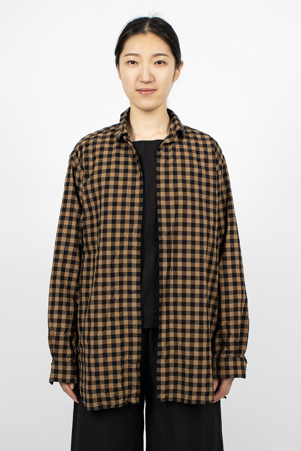 Black and beige checkered shirt.