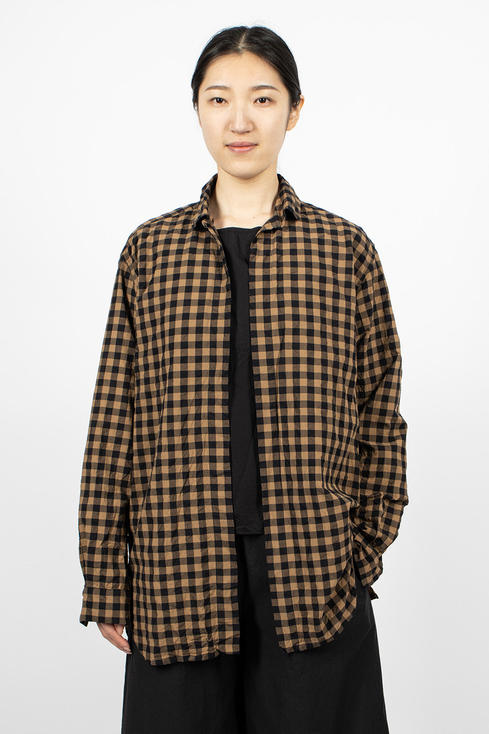 Black and beige checkered shirt.