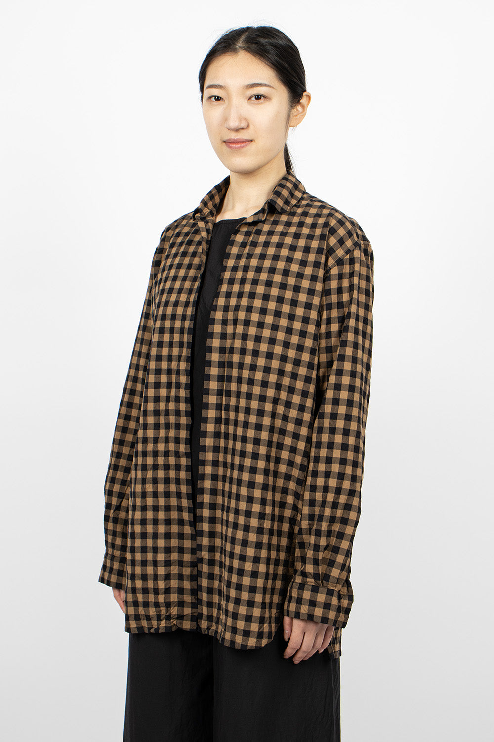 Black and beige checkered shirt.