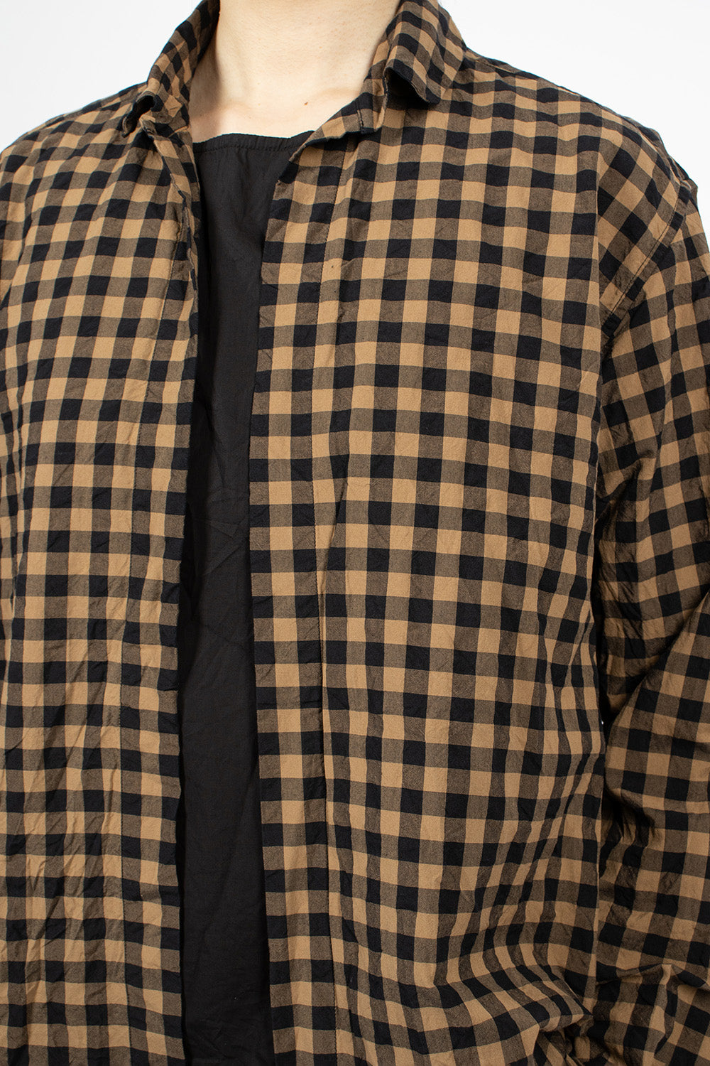 Black and beige checkered shirt.