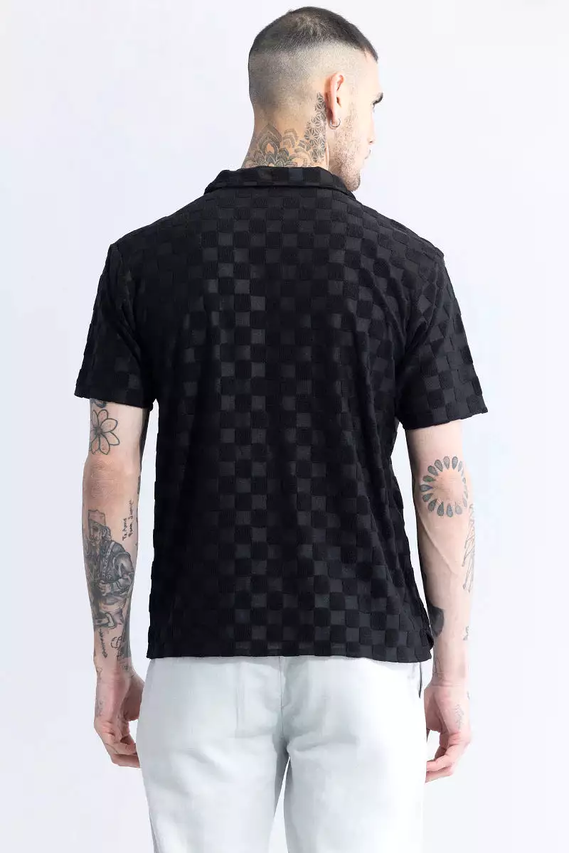 black chess print shirt