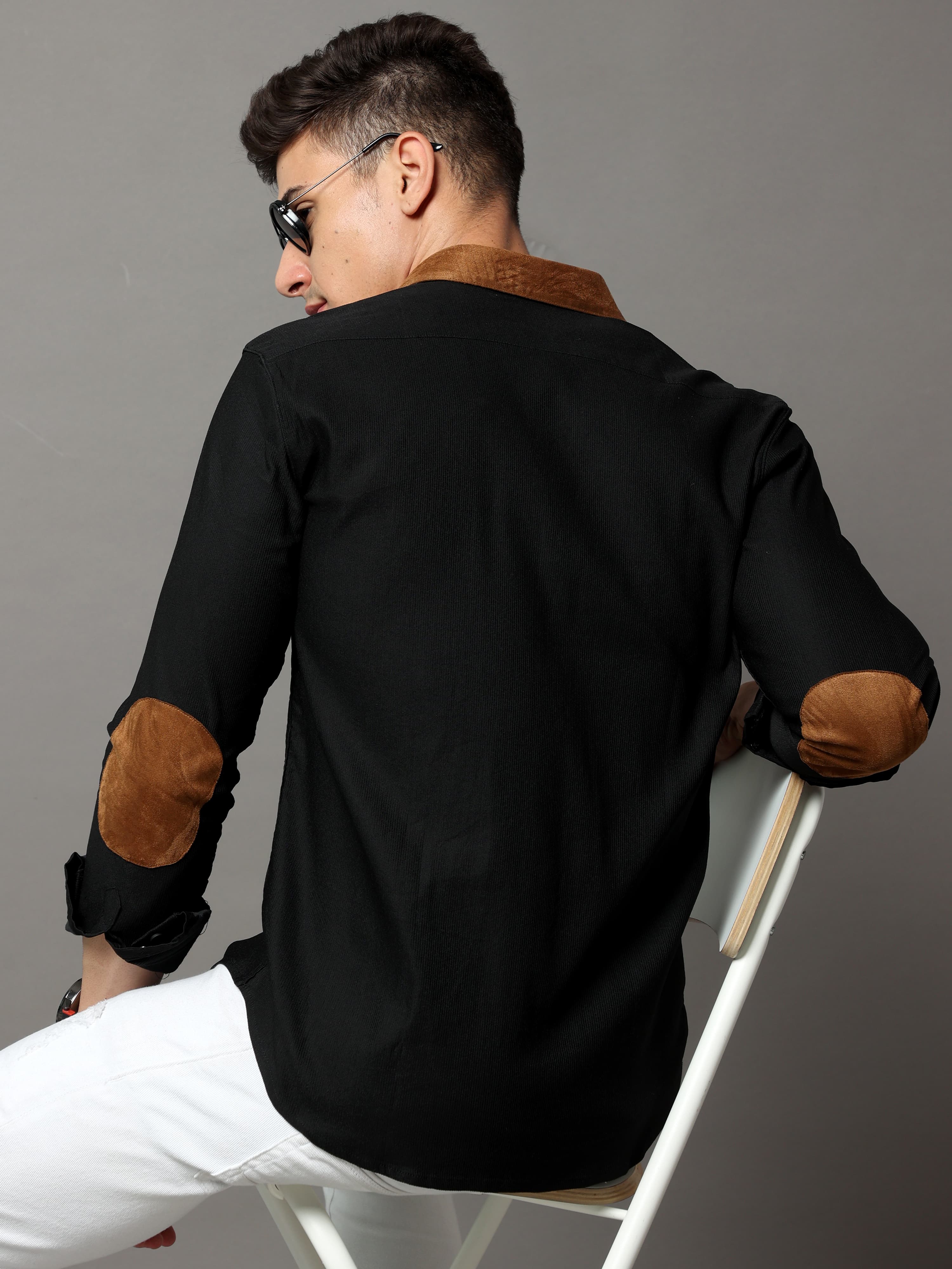 Black cotton corduroy shirt with self-stripe pattern and leather contrast.