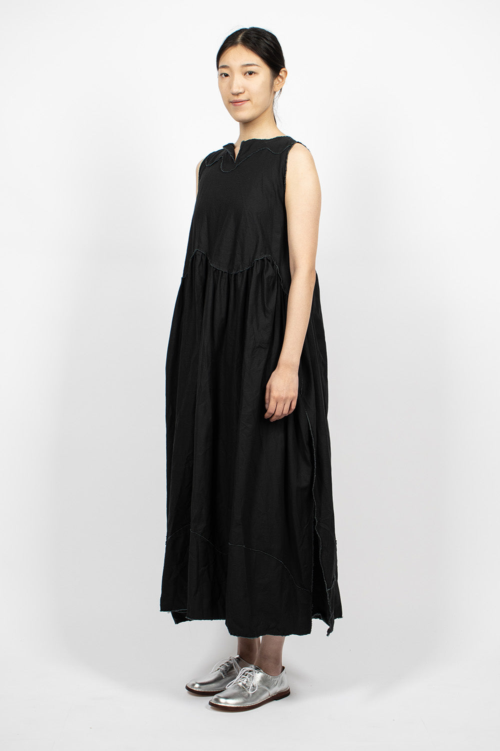 Black raw cut pinafore dress