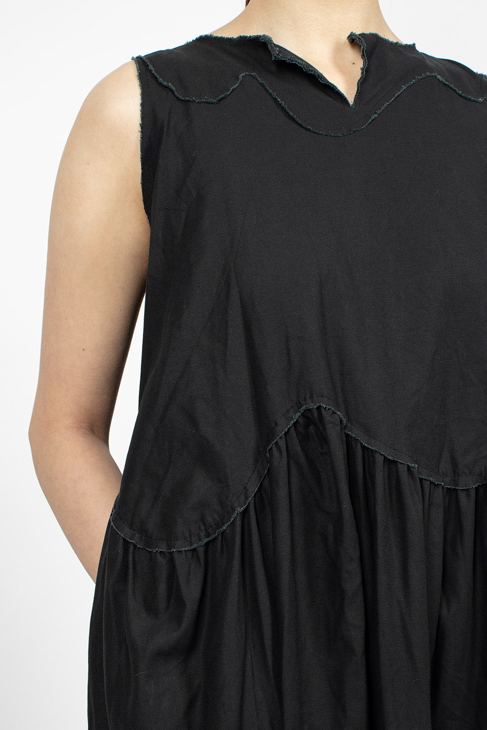 Black raw cut pinafore dress