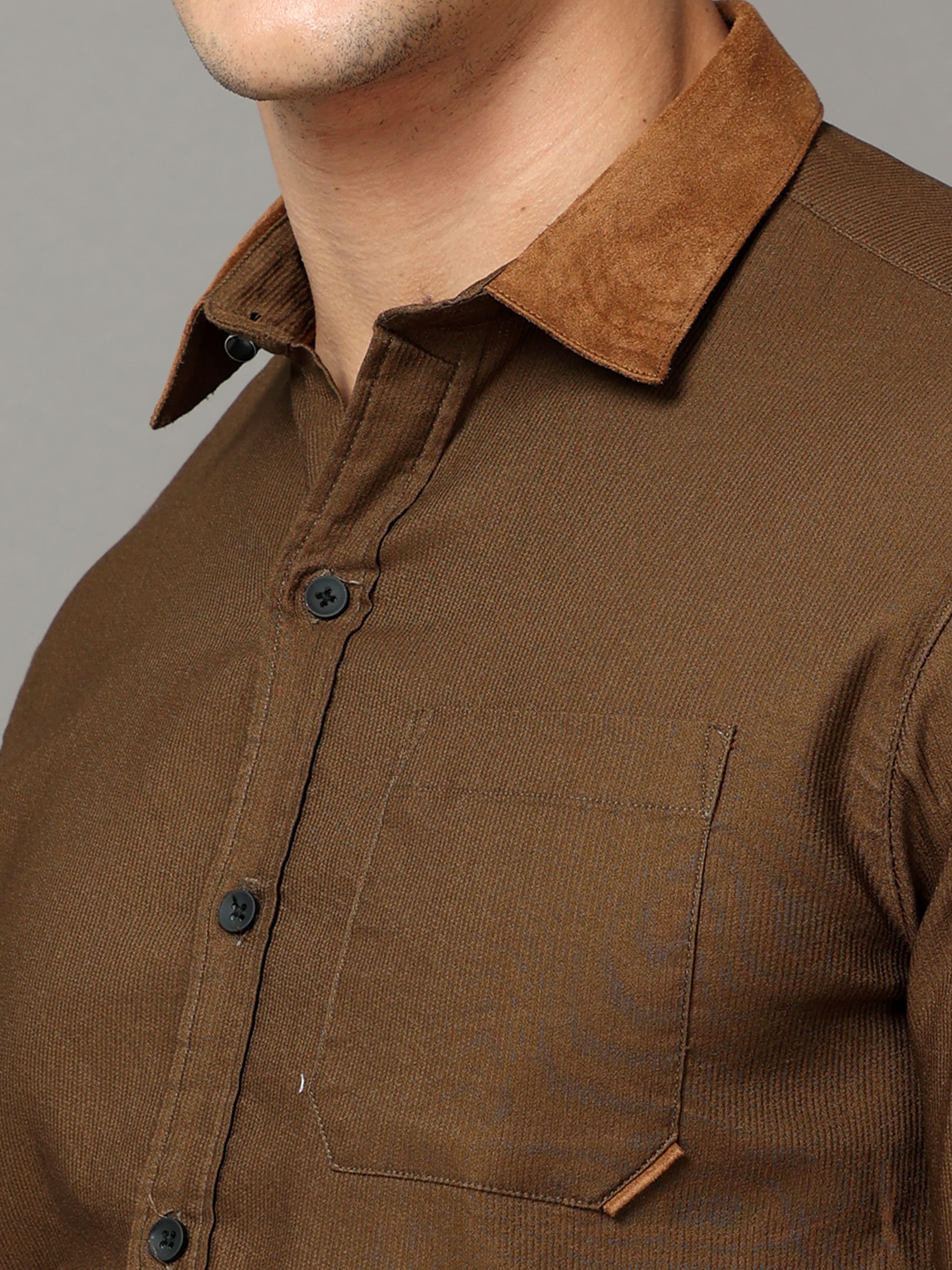 Brown self stripe corduroy shirt with leather contrast.