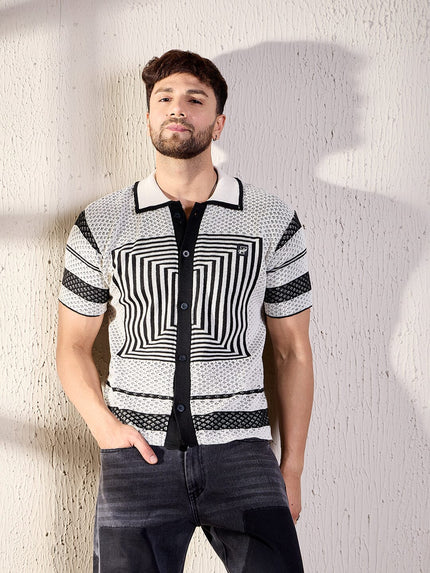 crochet shirt with white and black geometric pattern.