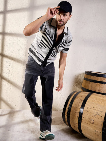 crochet shirt with white and black geometric pattern.