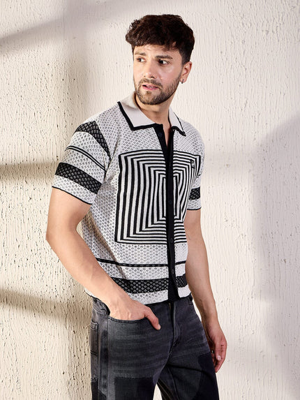 crochet shirt with white and black geometric pattern.