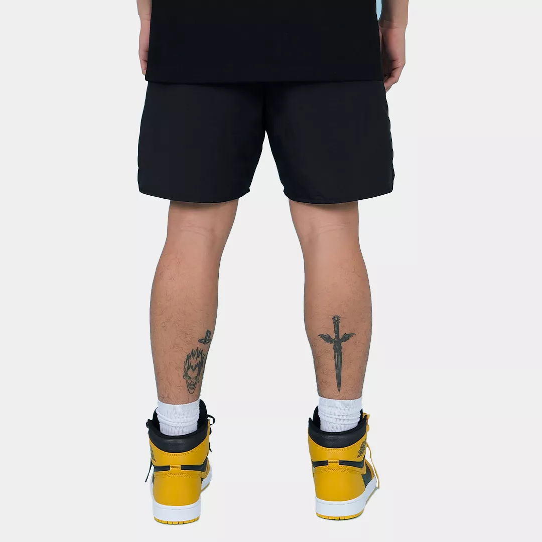 monogram black and yellow nylon shorts