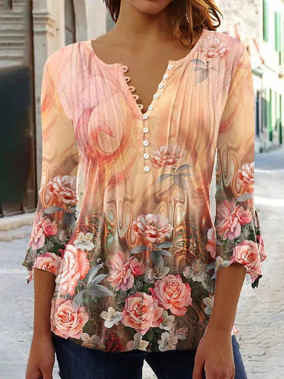 Versatile Orange Floral Shirt with 3/4 Sleeves.