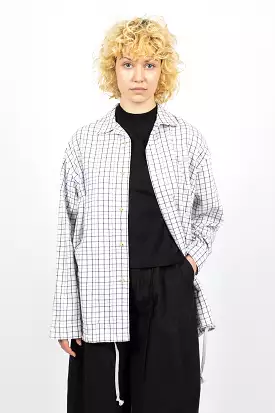 White and black flannel overshirt.