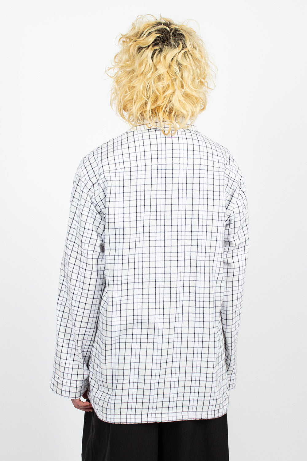 White and black flannel overshirt.