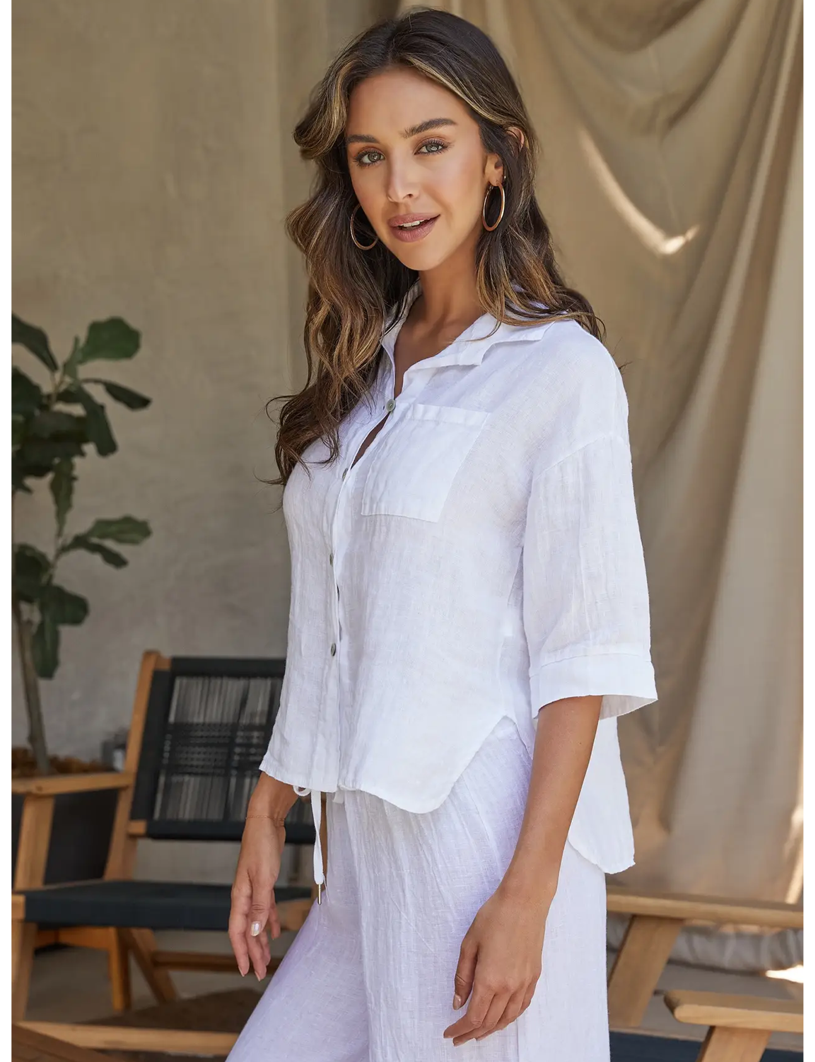 White linen button down shirt 3/4 sleeve.